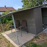 The back of the bike repair shed