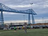 The group playing football together 