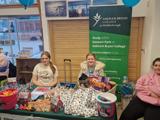 The group running their farmers' market stall