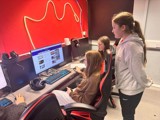 The Key+ group looking on the internet and booking the escape room activity 